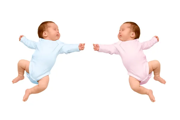 Два сна новорожденного идентичные близнецы, мальчик и девочка — стоковое фото