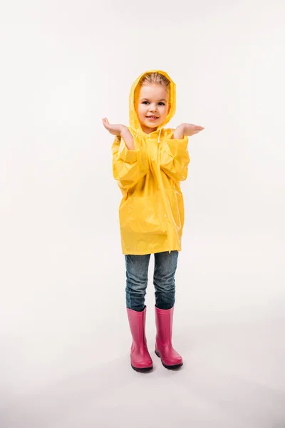 Маленький Ребенок Желтый Плащ Резиновые Сапоги Изолированные Белом Фоне — стоковое фото