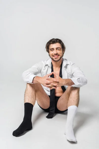 Smiling Man Shirt Underwear Black White Socks Grey Backdrop — стоковое фото