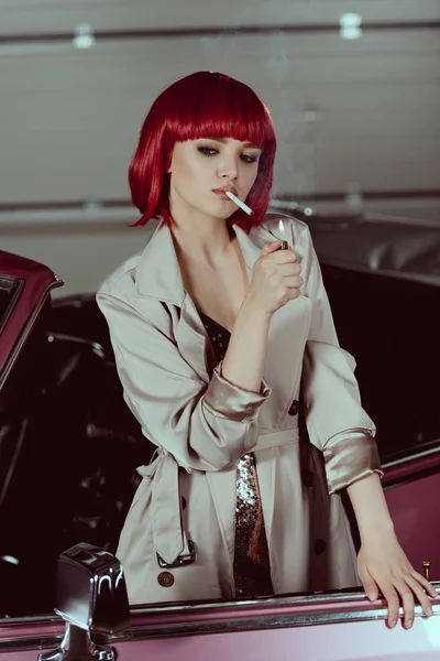Beautiful Young Woman Red Wig Stylish Trench Coat Smoking Cigarette — стоковое фото