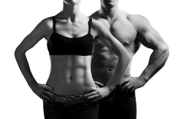 Человек и женщина в спортзале — стоковое фото